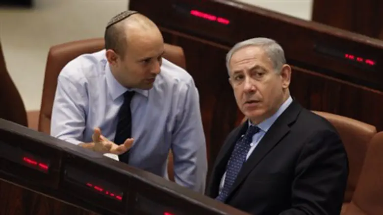 Jewish Home head Naftali Bennett (L) with Likud chief PM Binyamin Netanyahu