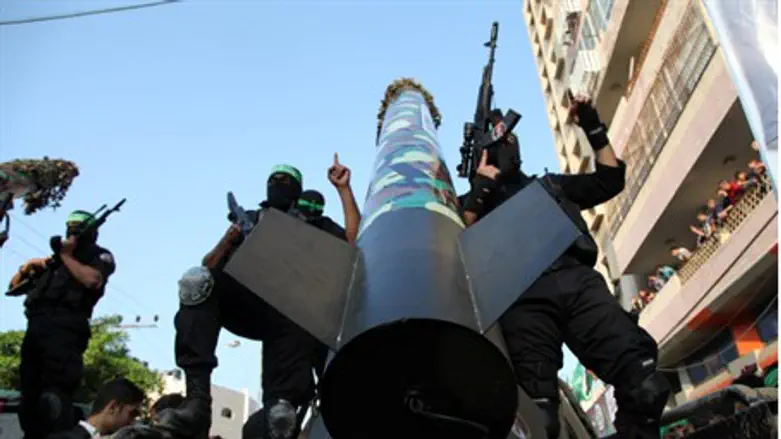 Gaza terrorists parade rocket