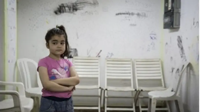 Child in a bomb shelter, Ashkelon.