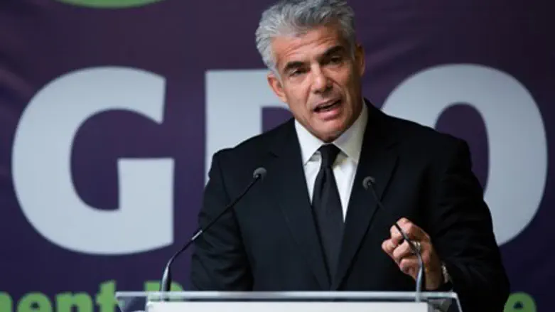 Finance Minister Yair Lapid at press conferen