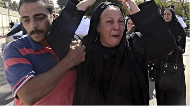 Family members react at funeral of slain Egyp