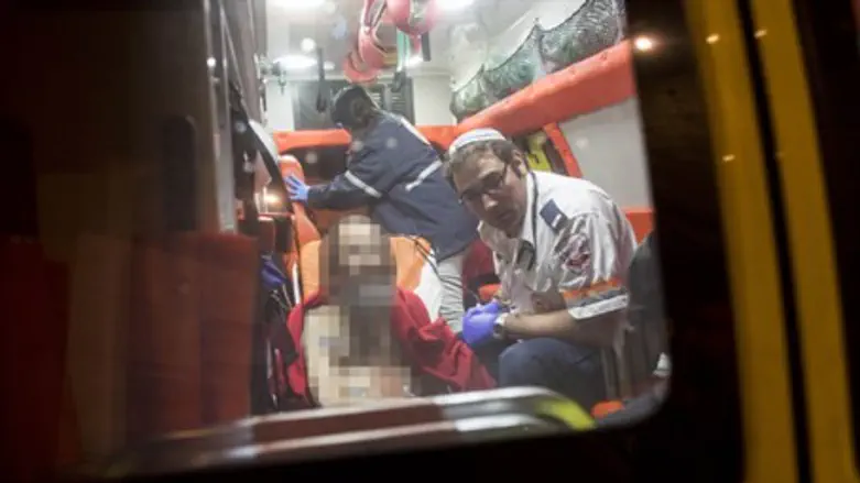 Stabbing victim in ambulance
