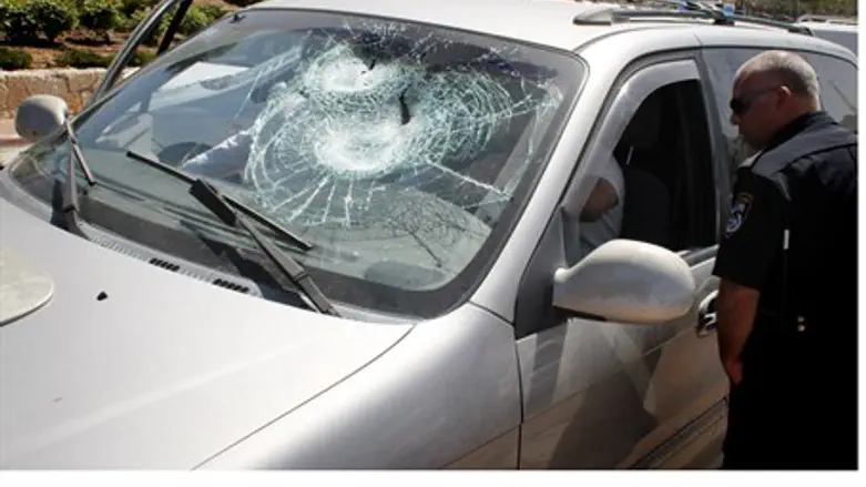 Car windshield smashed in rock attack (file)