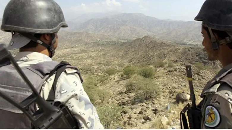 Saudi soldiers guard the border with Yemen