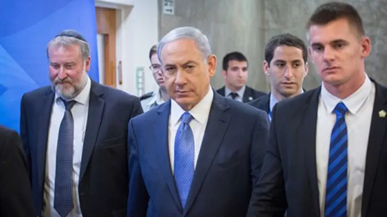 Prime Minister Binyamin Netanyahu arrives at weekly cabinet meeting