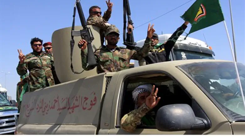 Shia militiamen in Tikrit