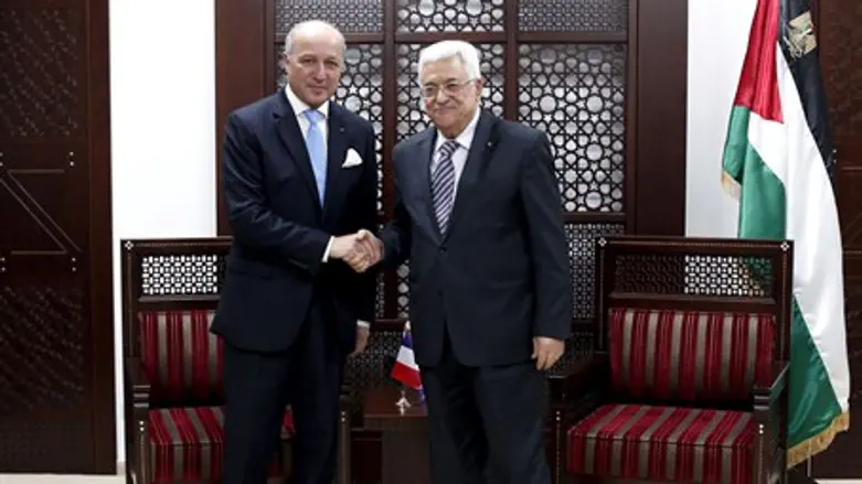 French Foreign Minister Laurent Fabius and PA chairman Mahmoud Abbas