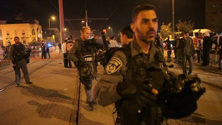 Police at the site of Jerusalem stabbing attack