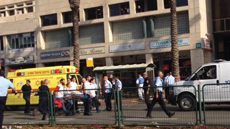 Terrorist carried away in stretcher after Raanana attack