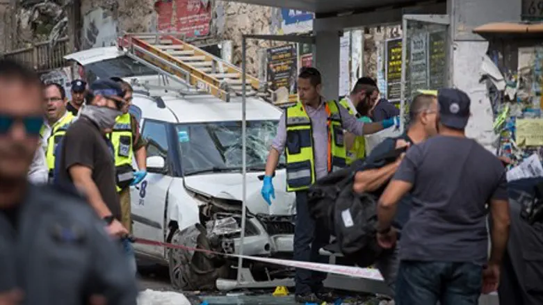 Emergency workers at site of Jerusalem car attack