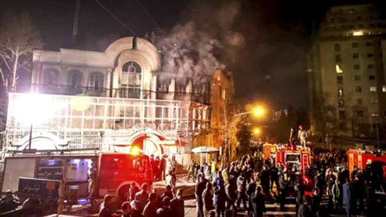 Flames rise from Saudi Arabia's embassy during a demonstration in Tehran