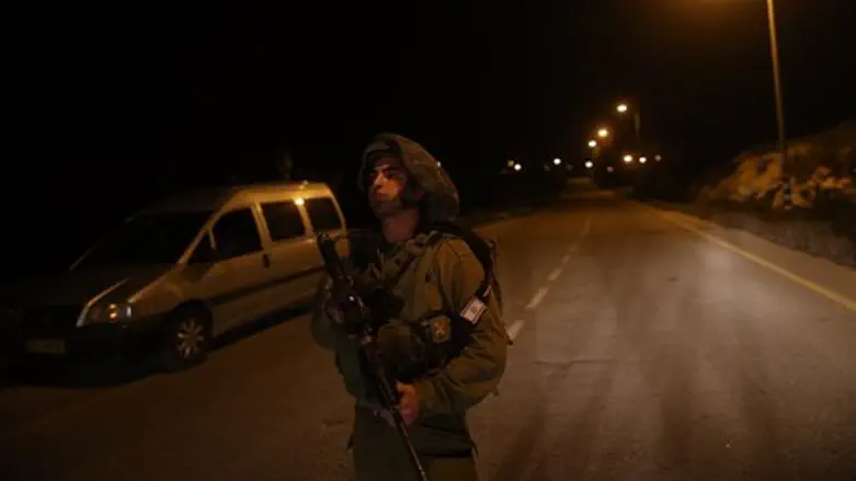 IDF soldier near where Dafna Meir was murdered in Otniel