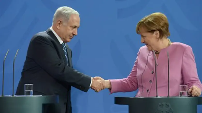 Netanyahu and Merkel at press conference in Berlin