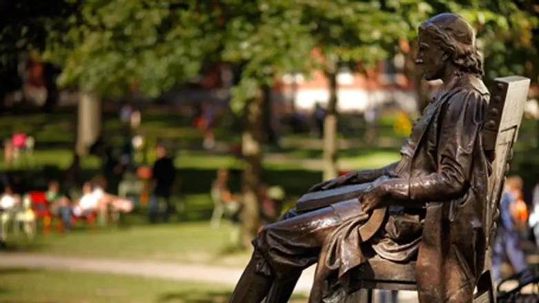 The Statue of Harvard University's first benefactor, John Harvard, sits in Harvard Yard