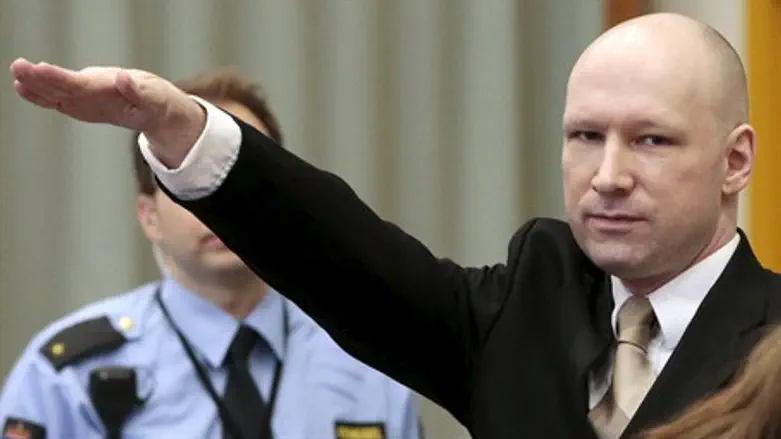 Anders Behring Breivik gives Nazi salute to court