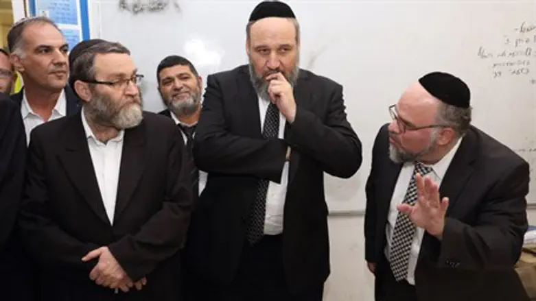 Moshe Gafni (second from left)