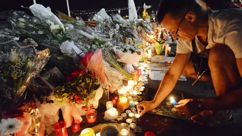 Mourners at the scene of Nice attack