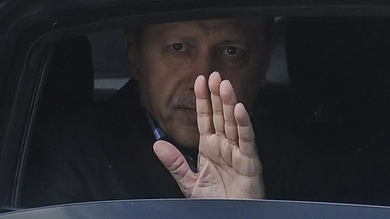 Turkish President Erdogan waves from his car following failed coup