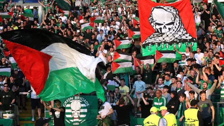 Celtic fans with PLO flags
