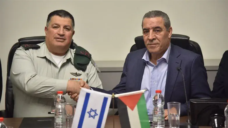 Major General Yoav Mordechai and Hussein a-Sheikh