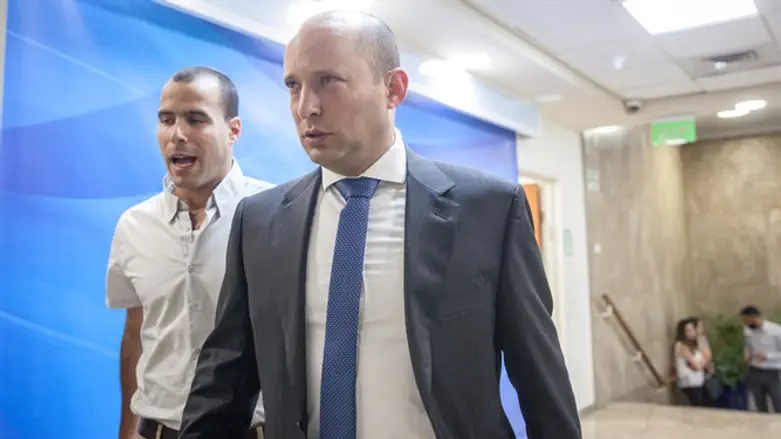 Education Minister Naftali Bennett arrives at weekly cabinet meeting at Prime Minister off