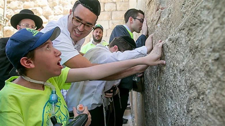 Celebrating the boys' bar mitzvah at the Western Wall