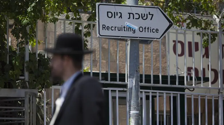 Sign for IDF recruitment office with Hareidi man inf rnt of it (illustrative