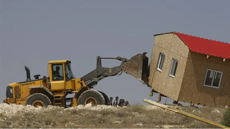 Bulldozer destroys Jewish structure