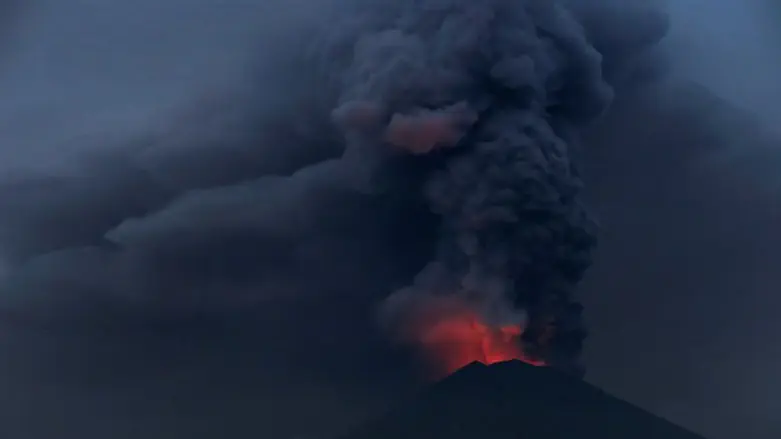 Glowing light of hot lava seen during eruption of Mount Agung as seen from Amed in Karanga