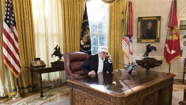 Trump in the Oval Office receiving the latest updates from Capitol Hill on negoti