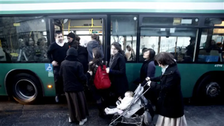 Women boarding bus.