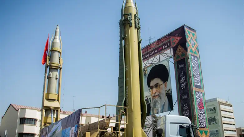 Display featuring missiles and a portrait of Iran's Supreme Leader Ayatollah Ali Khamenei