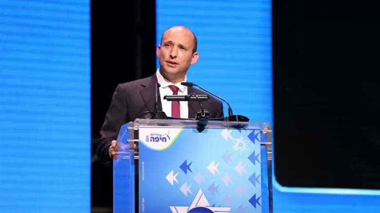 Naftali Bennett speaks at the Haifa conference