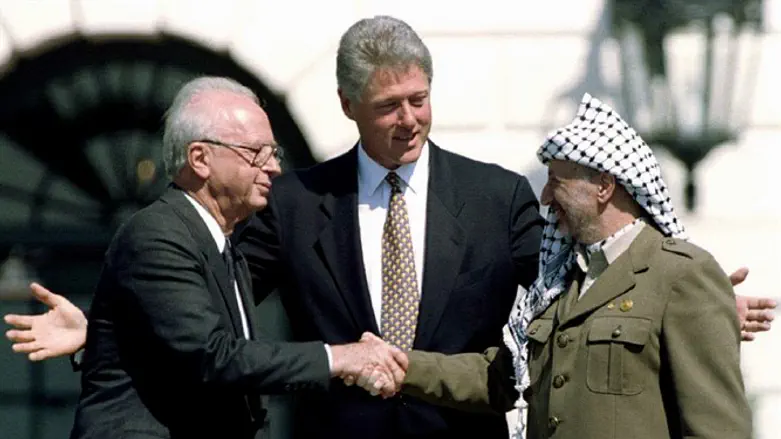 Yitzhak Rabin, Yasser Arafat, and Bill Clinton at signing of Oslo Accords