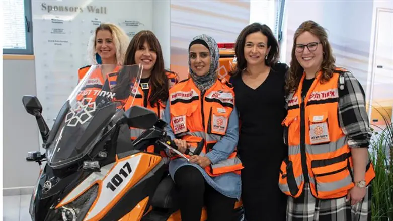 Sheryl Sandberg with United Hatzalah volunteers