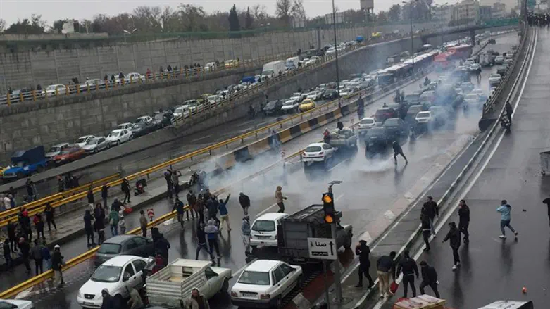 Protest against increased gas price on a highway in Tehran