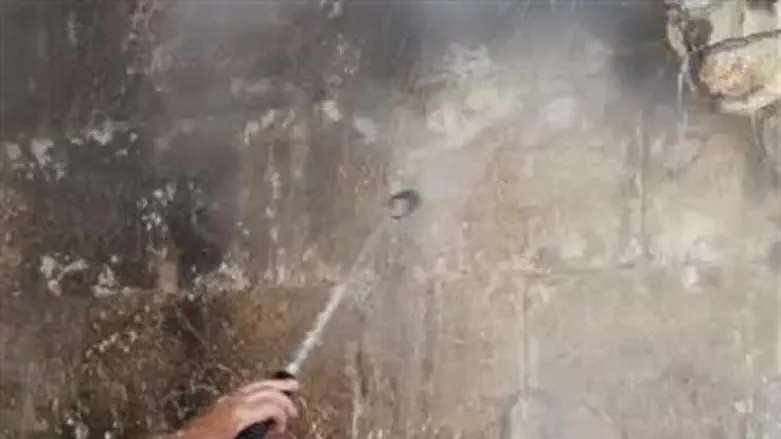 cleaning the Little Western Wall