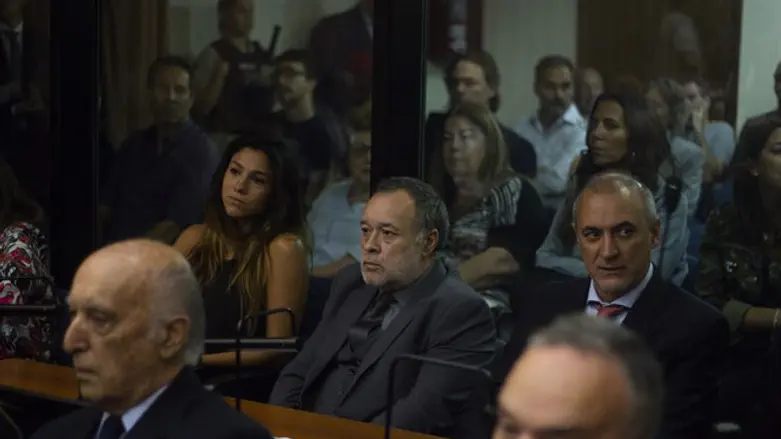 Carlos Telleldin looks on during his trial 