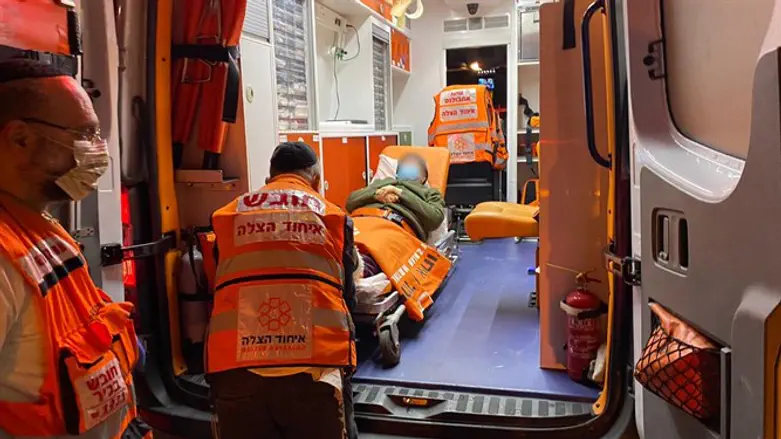 Ambulance transports elderly to COVID vaccination